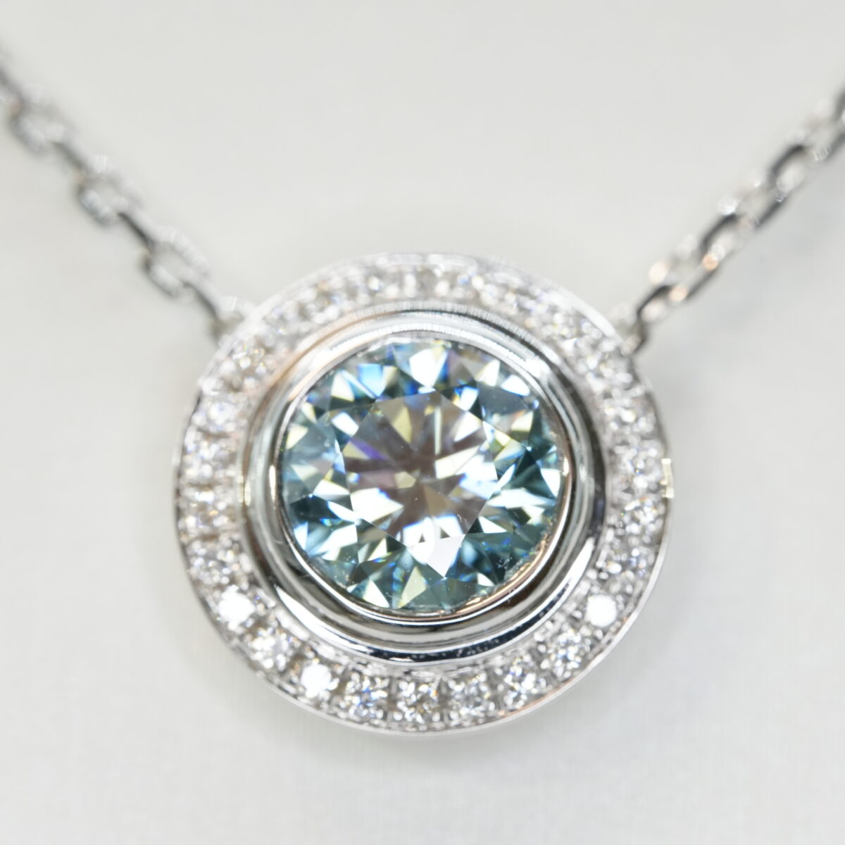 Round laboratory grown blue diamond halo pendant necklace