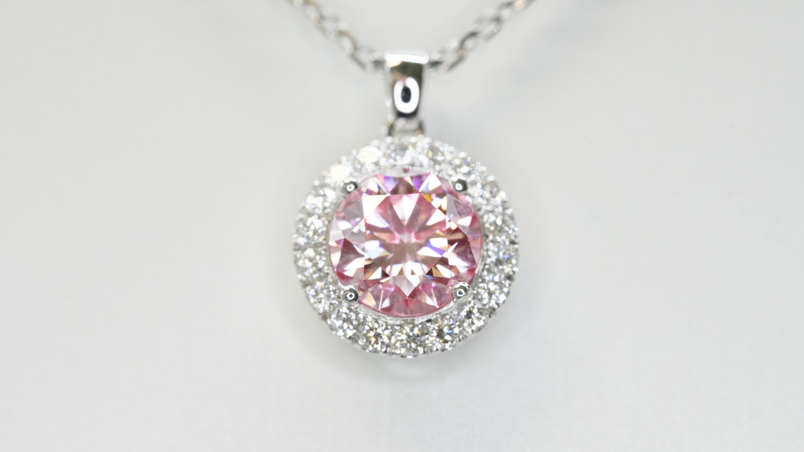 Round laboratory grown pink diamond halo pendant necklace Round laboratory grown pink diamond halo pendant necklace